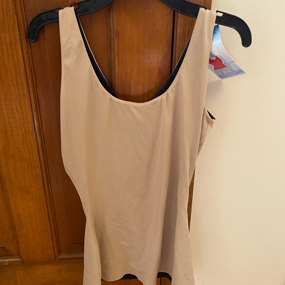 Spank- flipside firmers 4 way tank